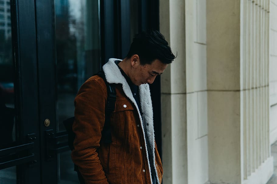 man standing against black door, apparel, clothing, coat, jacket, HD wallpaper