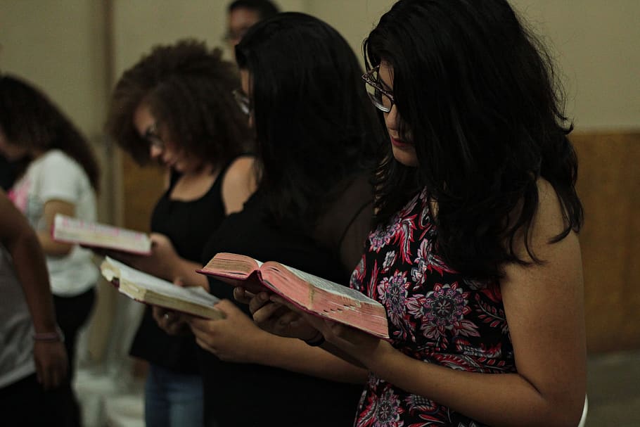 3-women-reading-book.jpg