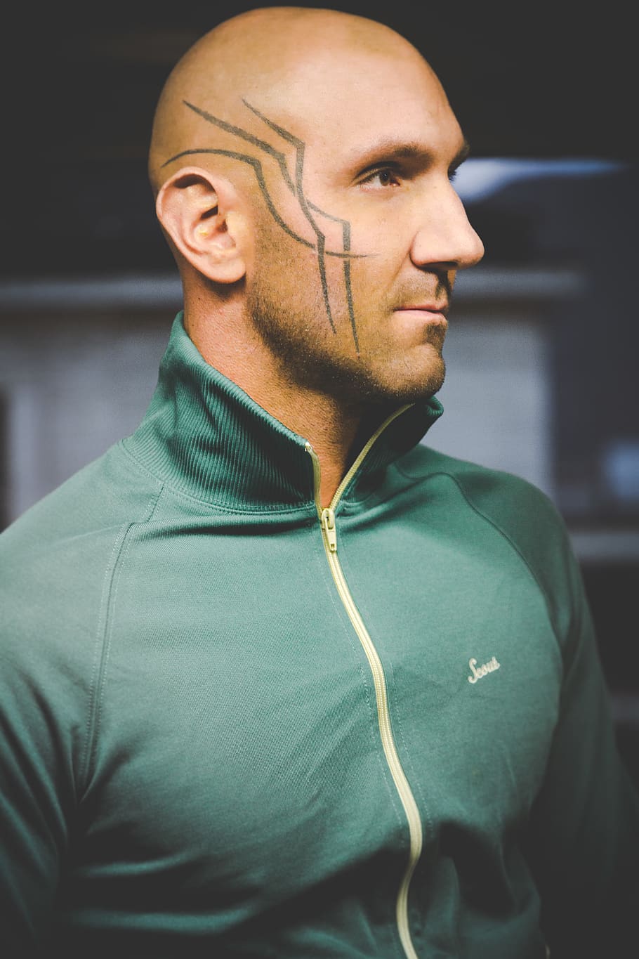 Man Wearing Green Zipped Jacket, adult, bald, casual, close-up