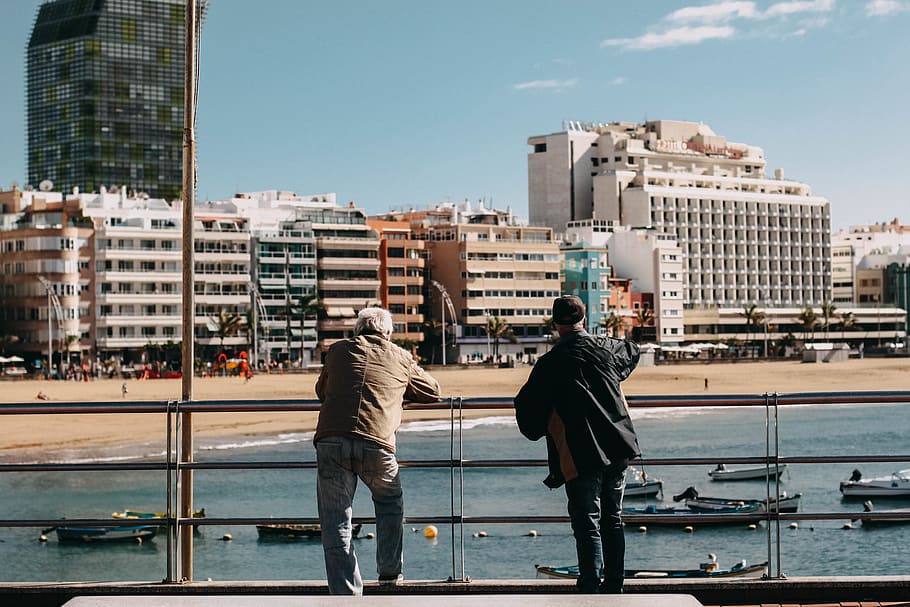 two men leaning on metal rails, people, human, person, spain, HD wallpaper