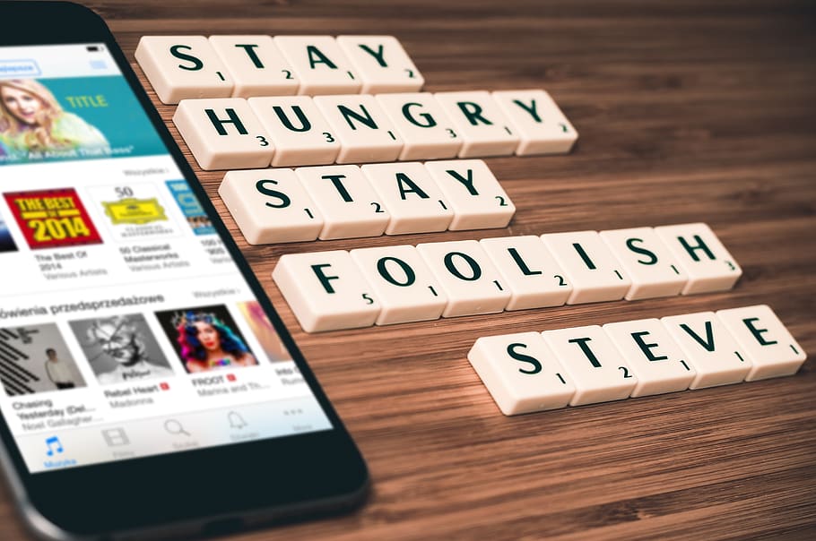 Smartphone Beside Scrabble Cubes on Table, apple, communication HD wallpaper