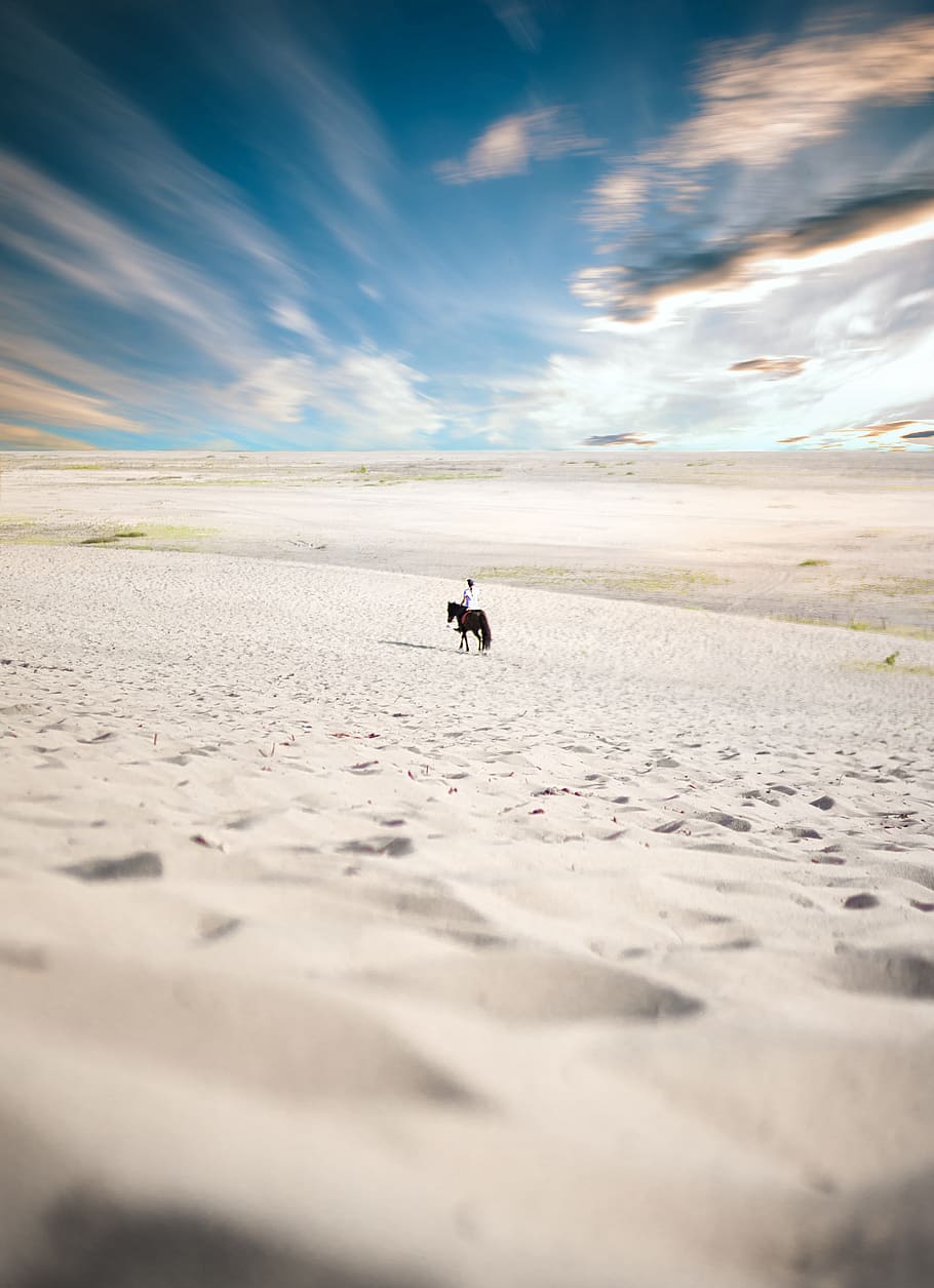 Man Riding Horse , arid, clouds, daylight, desert, person, sand HD wallpaper