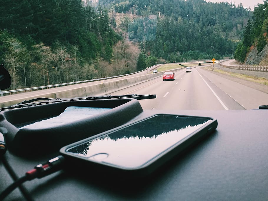 Iphone on Vehicle Dashboard, car, charging, road, roadtrip, street HD wallpaper