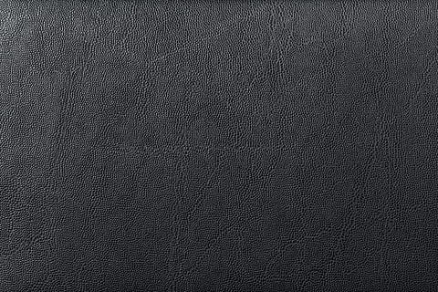 Close-up of black fake leather texture, Close-up of a black…