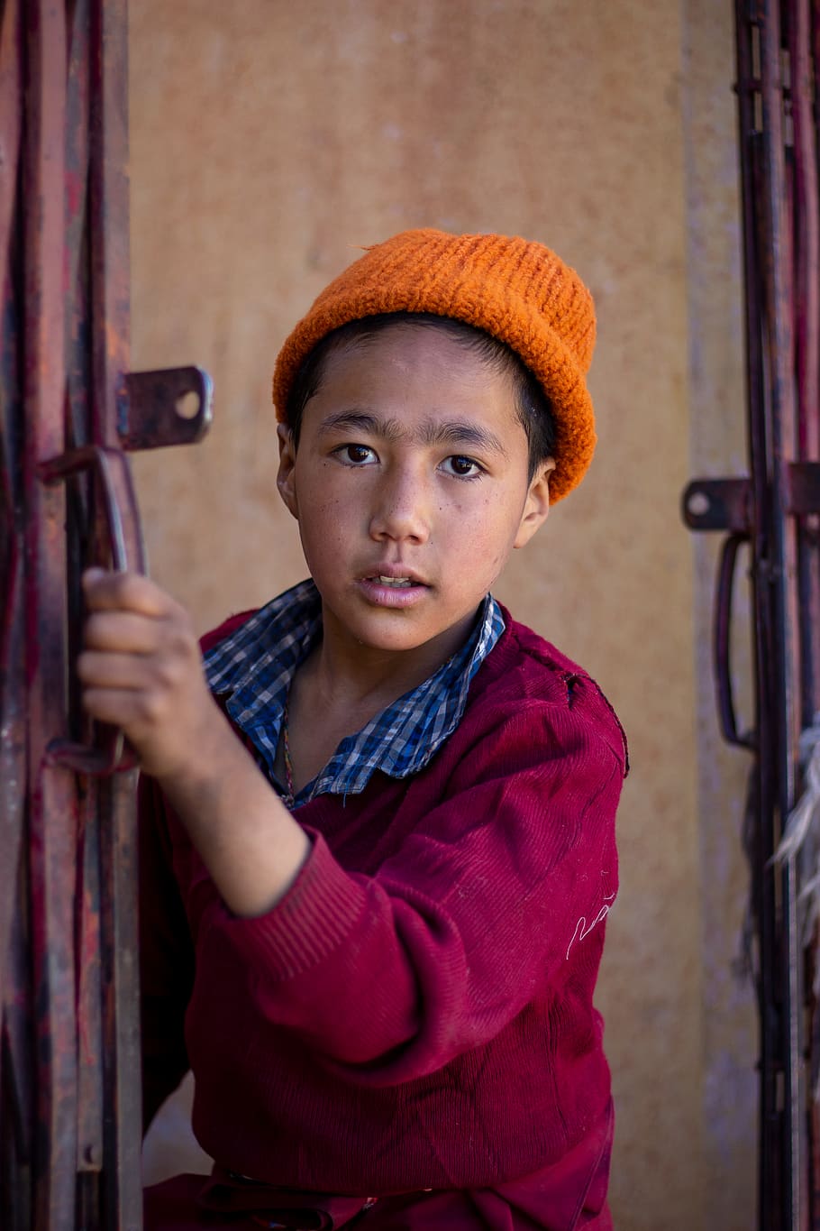 boy holding metal gate, person, human, people, india, girl, woman HD wallpaper