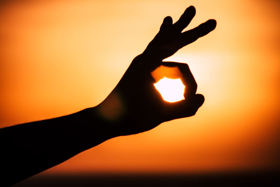 malta, ok, hand, left hand, thumb, nails, sunset behind hand