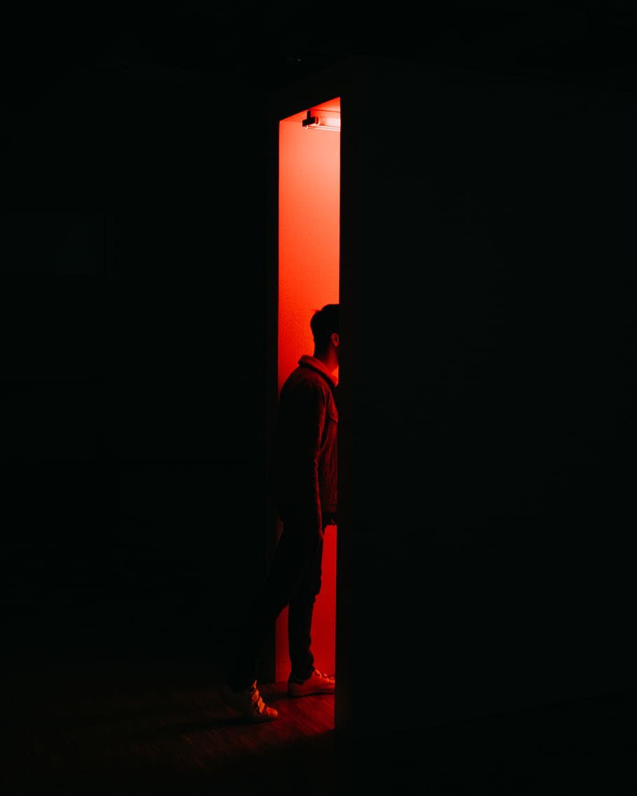 Person Standing on Opened Doorway, backlit, conceptual, dark