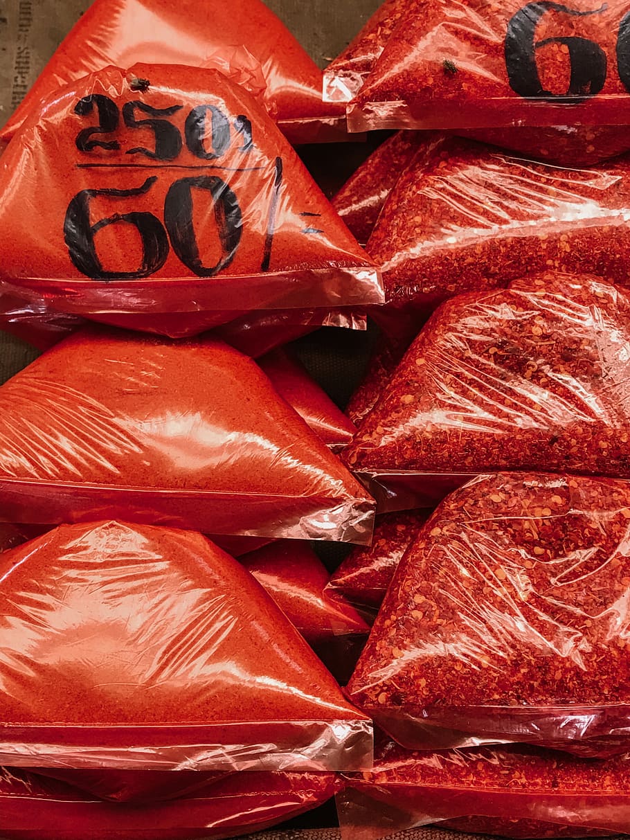 clear plastic pack with red powders, food, plant, cushion, vegetable HD wallpaper
