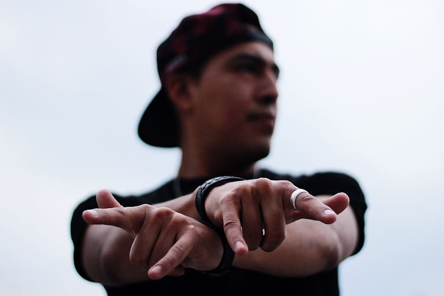 Photo of Man Doing Hand Signs, adult, blur, bracelet, cap, close-up, HD wallpaper