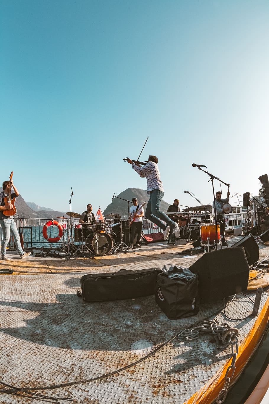Man Jumping, artists, background, band, concert, daylight, energy HD wallpaper