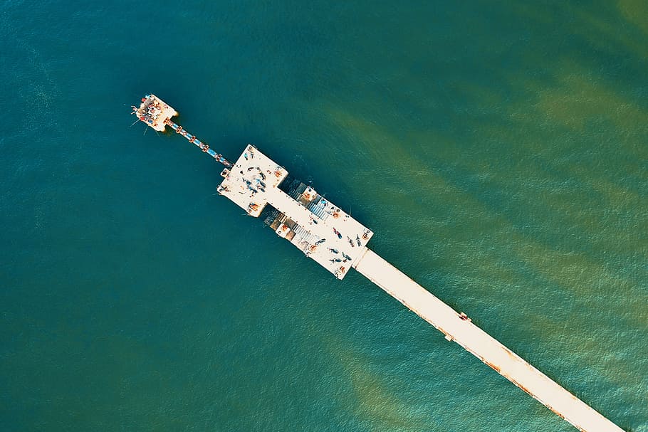 High Angle-photography of White Sea Dock on Green Water, aerial view HD wallpaper