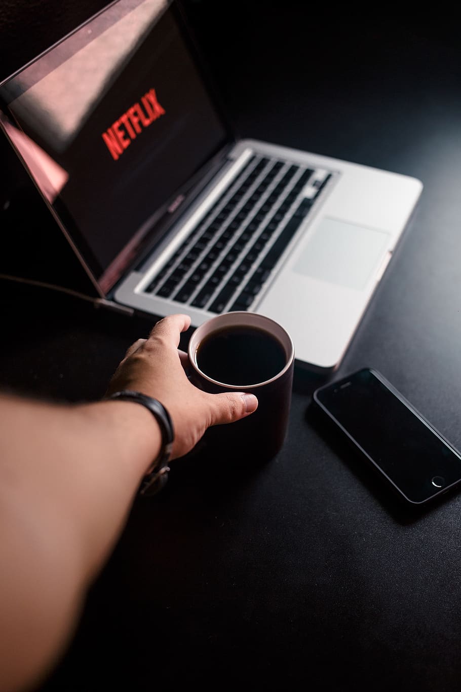 Person Reaching for Mug With Coffee Near Macbook Pro and Space Gray Iphone 6 HD wallpaper