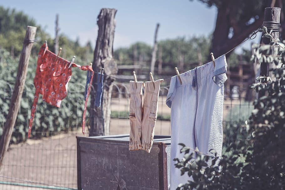 Laundry on Clothesline, various, hanging, drying, clothing, focus on foreground HD wallpaper