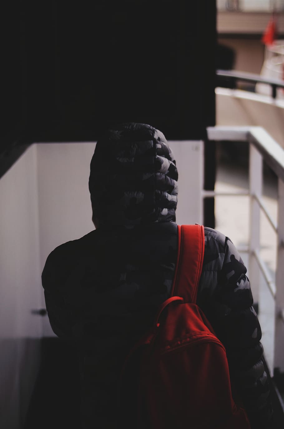 Man Wearing Hoodie, back view, backpack, dark, indoors, person HD wallpaper