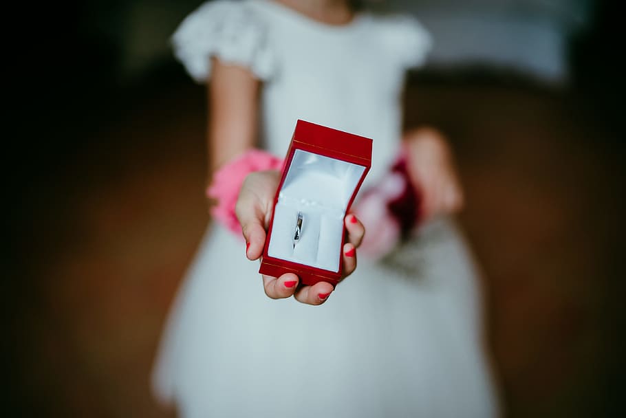 kid holding red ring box, bokeh, blur, give, married, love, innocence HD wallpaper