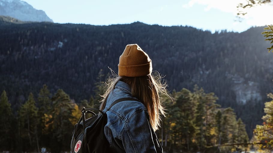 woman wearing blue denim jacket overlooking green forest, view HD wallpaper