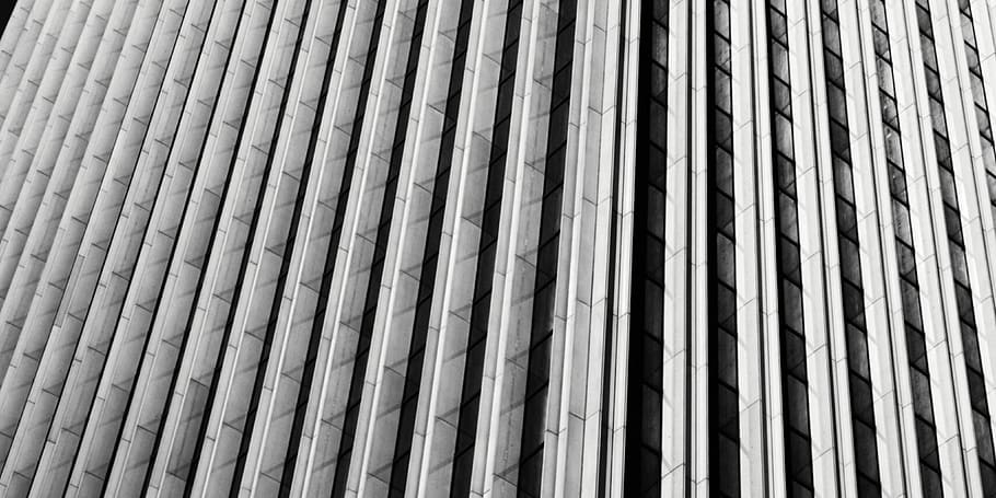 grayscale architecture photo of a building, office building, town