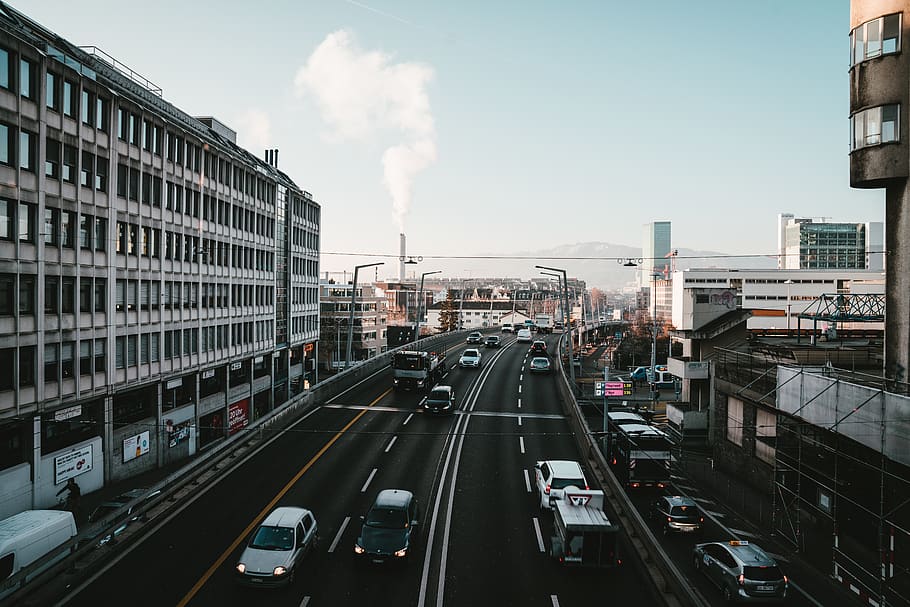 vehicles on road between buildings, transportation, architecture HD wallpaper