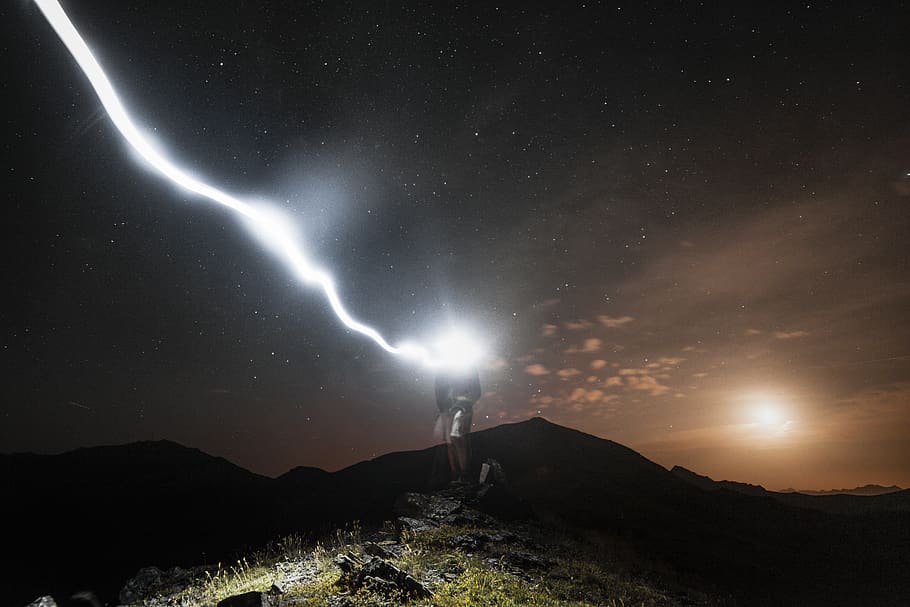 man standing on cliff at night, light, flare, nature, outdoors, HD wallpaper