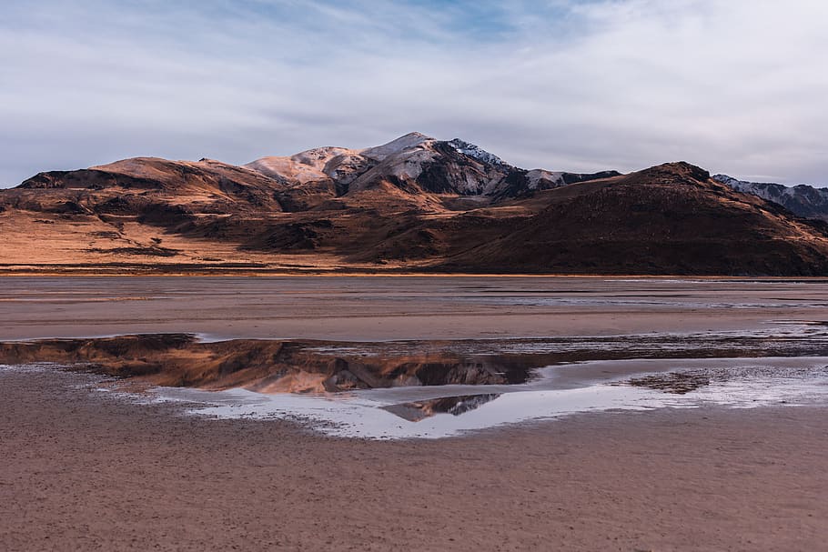 brown mountain with reflection on water, nature, outdoors, mountain range HD wallpaper