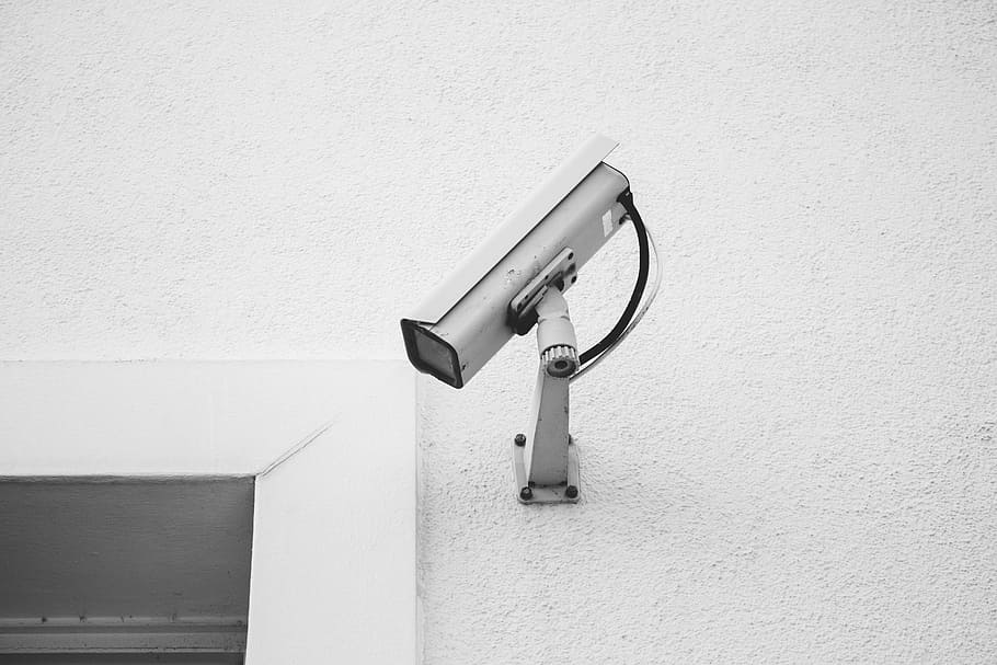 white security camera on white wall, cctv, urban, film, video