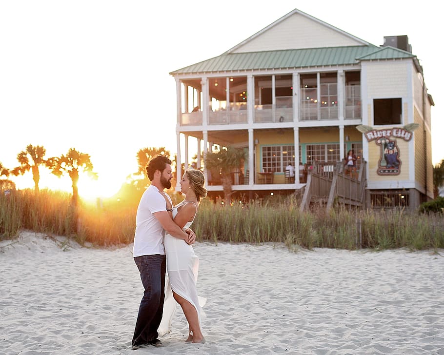 Man and Woman Hugging Each Other, adult, architecture, beach
