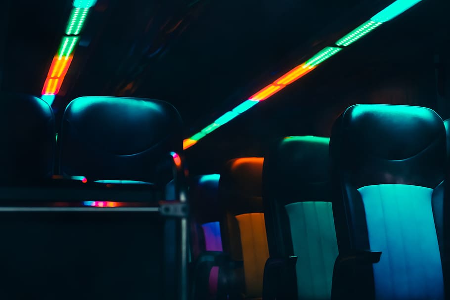 green and orange lights inside vehicle, cushion, bus, headrest HD wallpaper