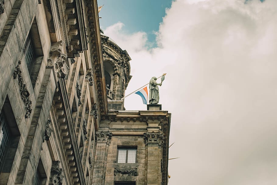 thick white clouds hovering above grey building, amsterdam, statue HD wallpaper