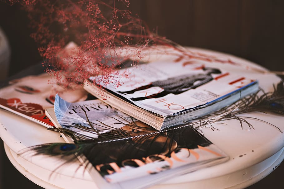Three Magazine on Table, art, close-up, color, conceptual, creativity