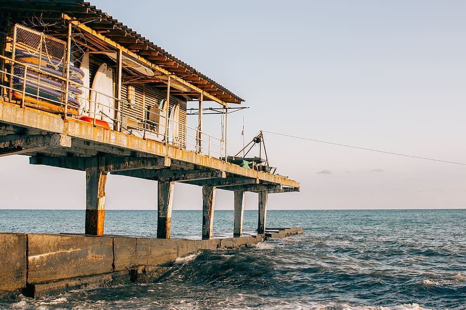 Brown Building On Sea, architecture, blacksea, columns, daylight HD wallpaper