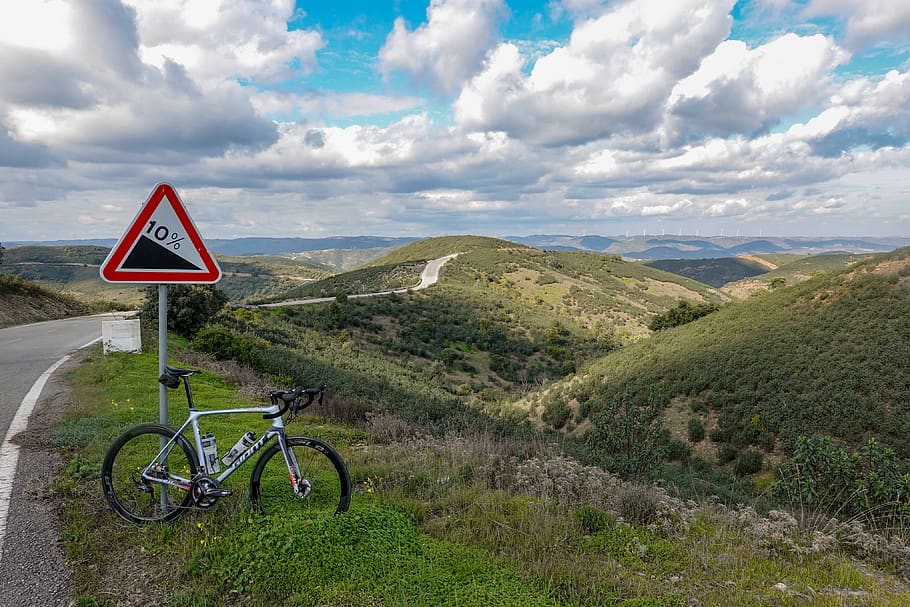 gray road bike beside signage, vehicle, bicycle, transportation