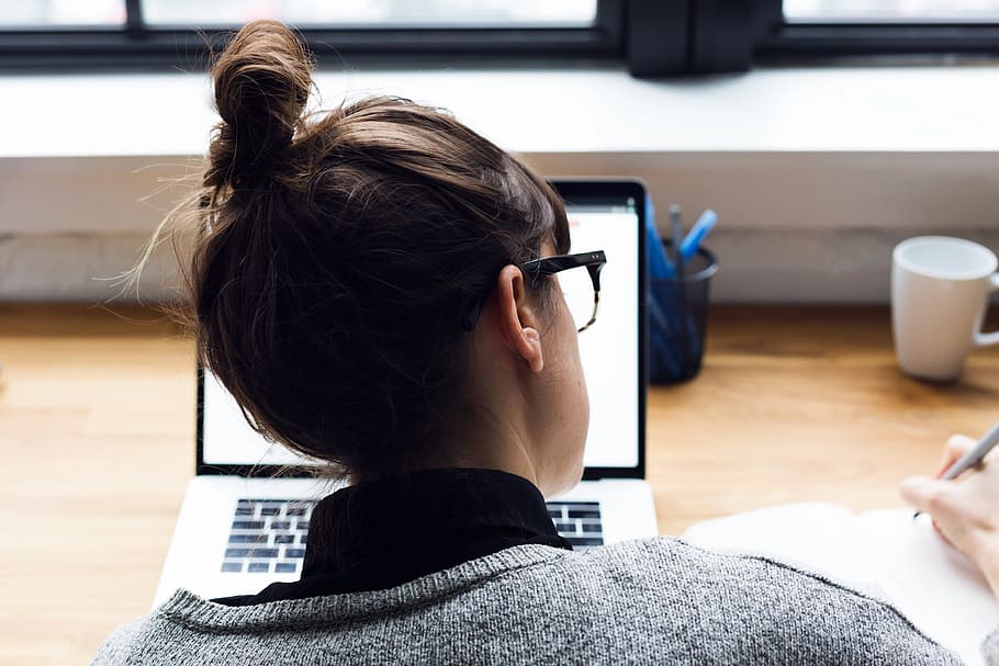 Female Taking Notes And Browsing Laptop Photo, Computer, Keyboard HD wallpaper