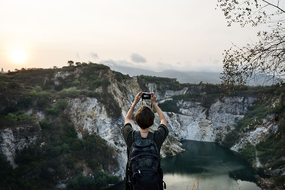 Man Taking Photo of Mountain, adventure, climb, daylight, enjoyment HD wallpaper