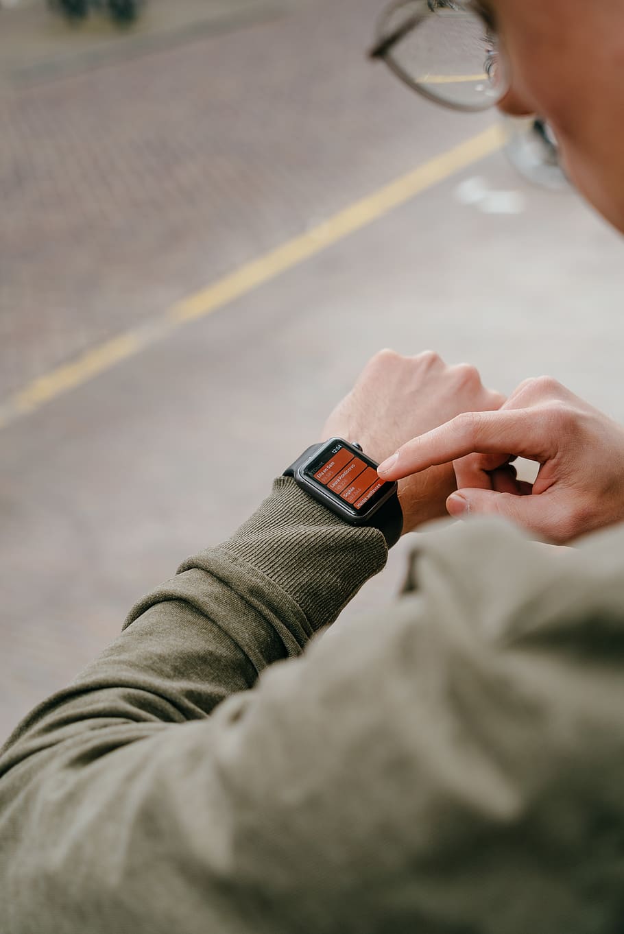 man using his smartwatch, human hand, real people, human body part HD wallpaper