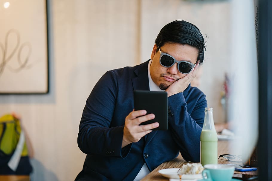 Man Wearing Grey Sunglasses Holding Black Tablet , bored, coffee shop HD wallpaper