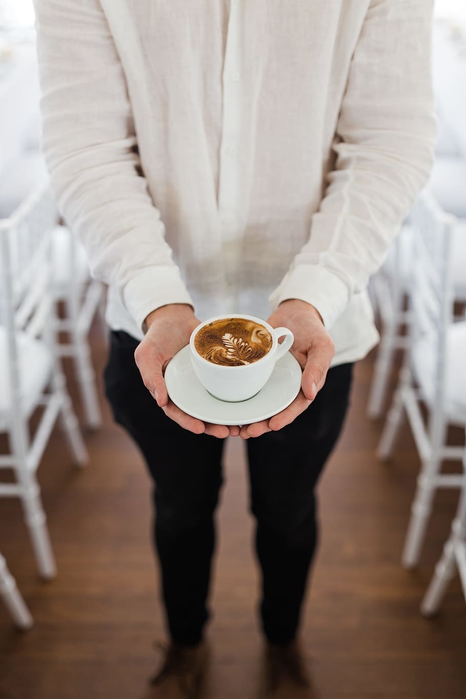 person holding coffee near dining tables, man, hands, latte, mug HD wallpaper