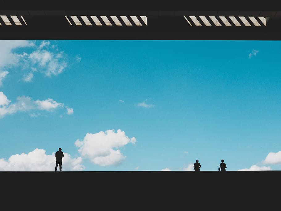 silhouette of three person against blue sky, cloud, building HD wallpaper