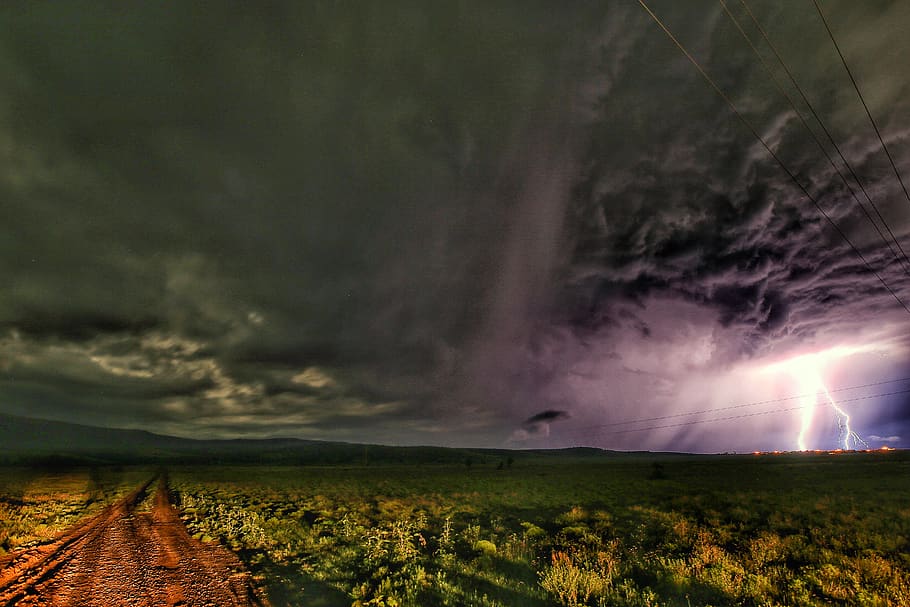 green filed under gray sky, cloud - sky, storm, landscape, environment HD wallpaper