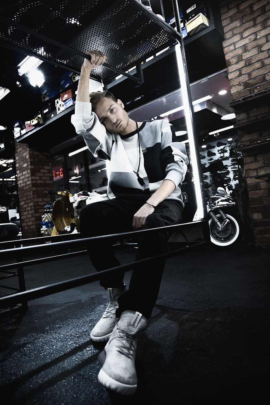man sitting on rail, shoe, footwear, apparel, clothing, person HD wallpaper
