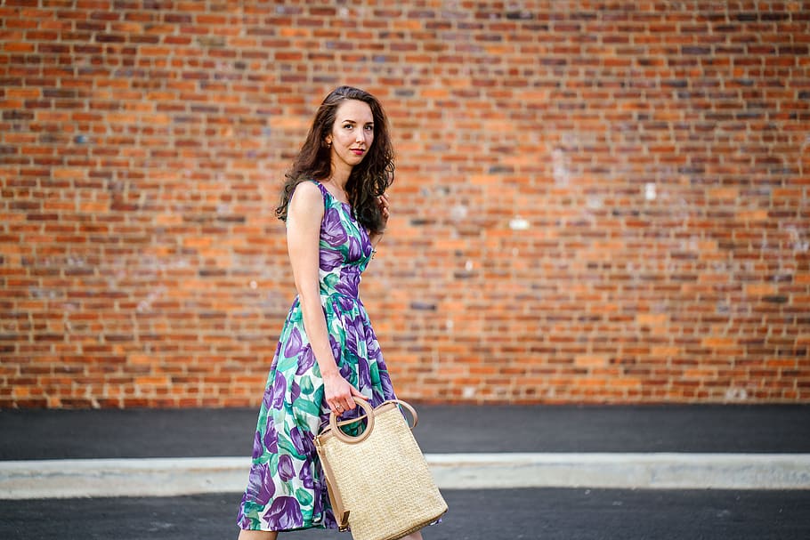 Woman in Purple Floral Dress With Beige Handbag, beautiful, bricks HD wallpaper