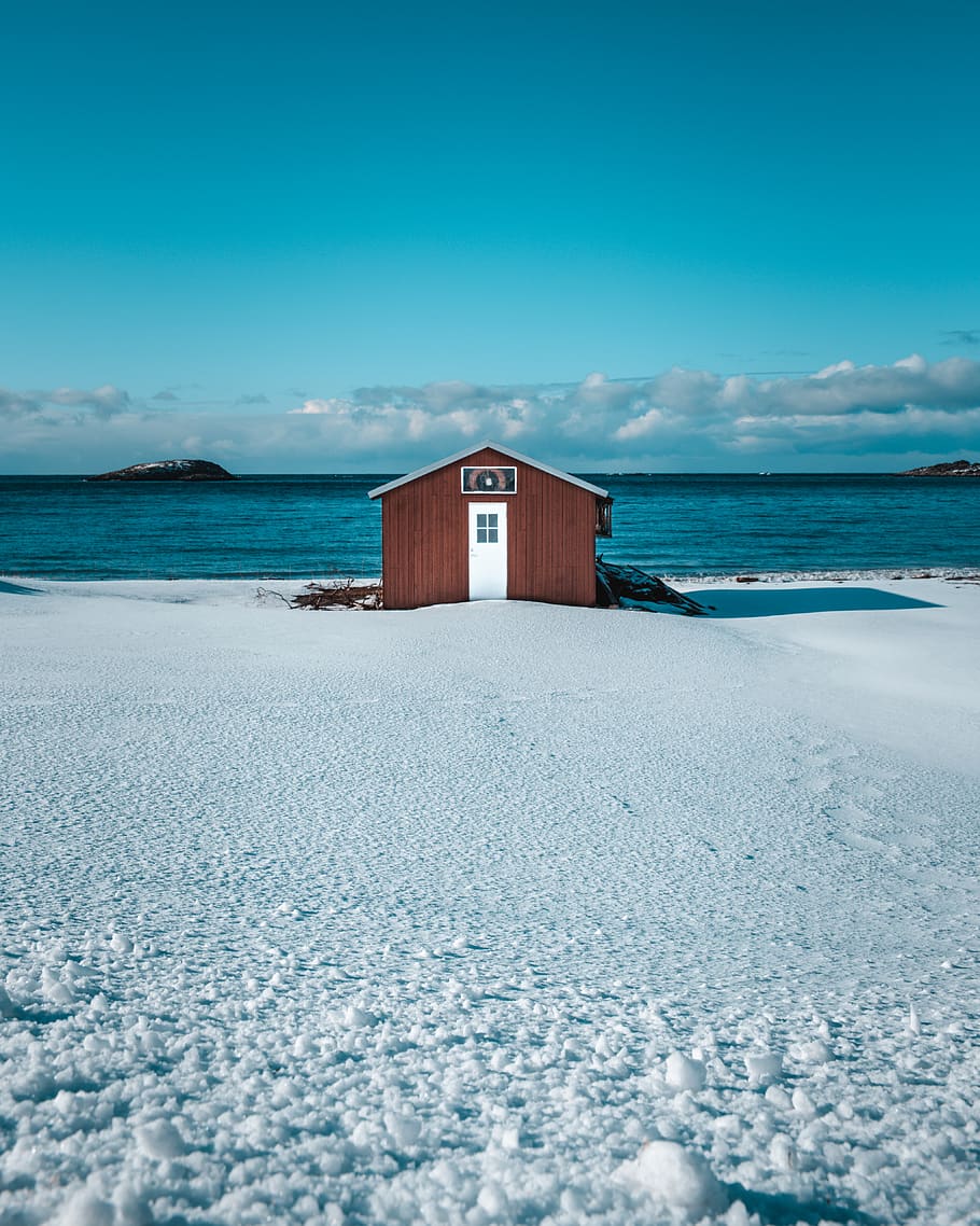 House on Snow Near Body of Water, beach, clouds, cold, island HD wallpaper