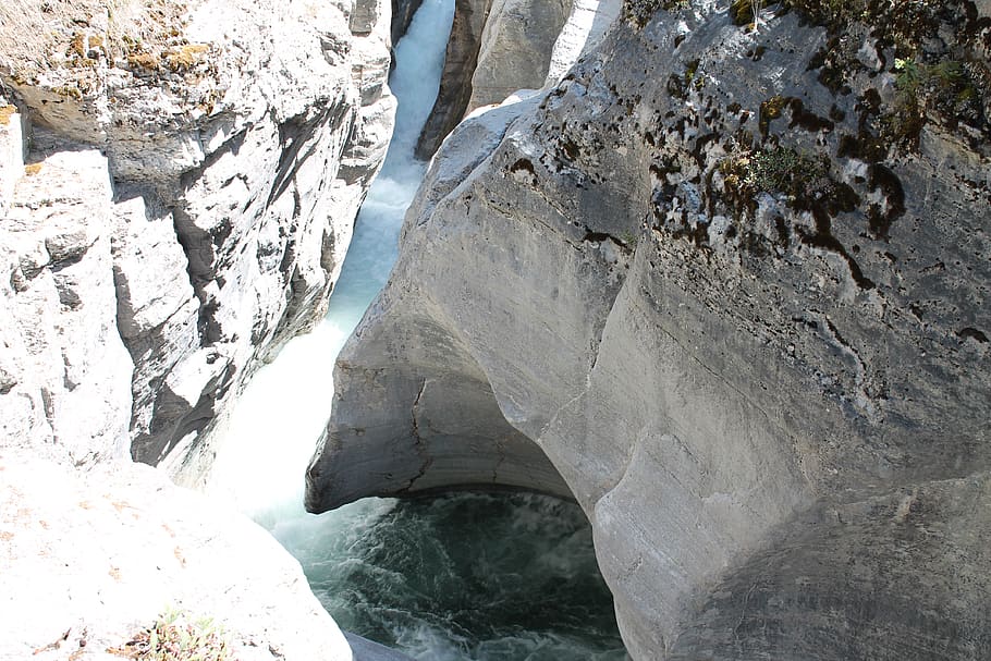 photo of gray rock, rapid, crevice, channel, gorge, whitewater