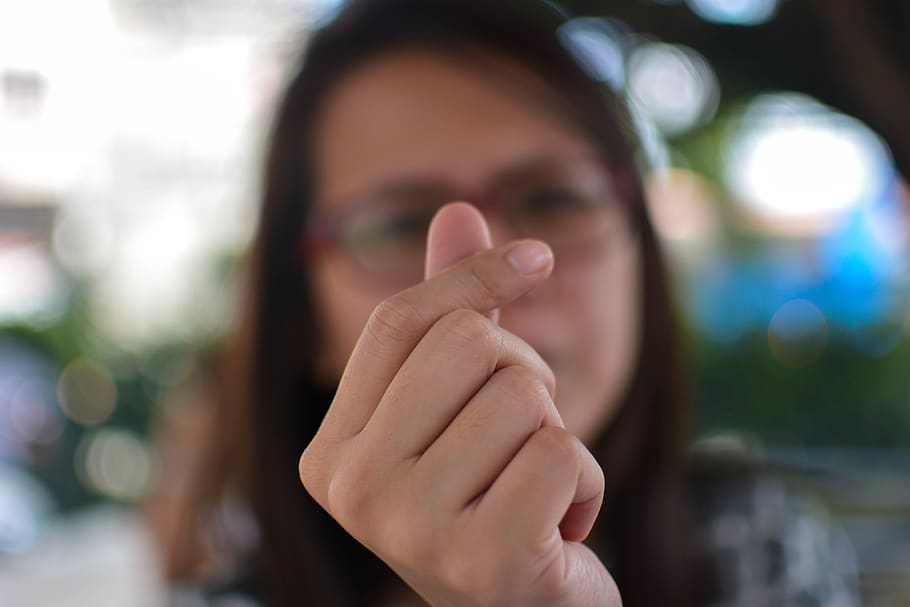 finger, heart, blur, portrait, human hand, one person, headshot HD wallpaper