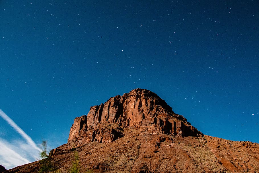 brown concrete mountain, rock, sky, night, star, cloud, blue HD wallpaper