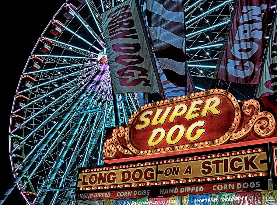 Super Dog Hot Dog Food Stall in Front of Ferris Wheel during Nighttime