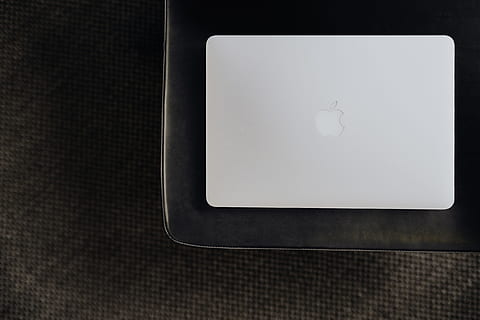 Stylish workspace with MacBook computer on home or studio, tech HD wallpaper