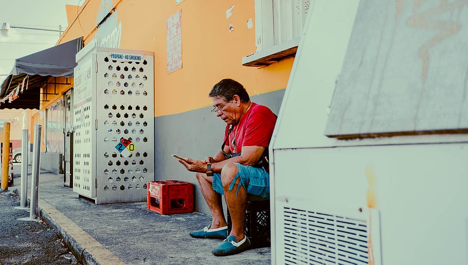 man sitting on sidewalk, human, person, footwear, apparel, clothing HD wallpaper