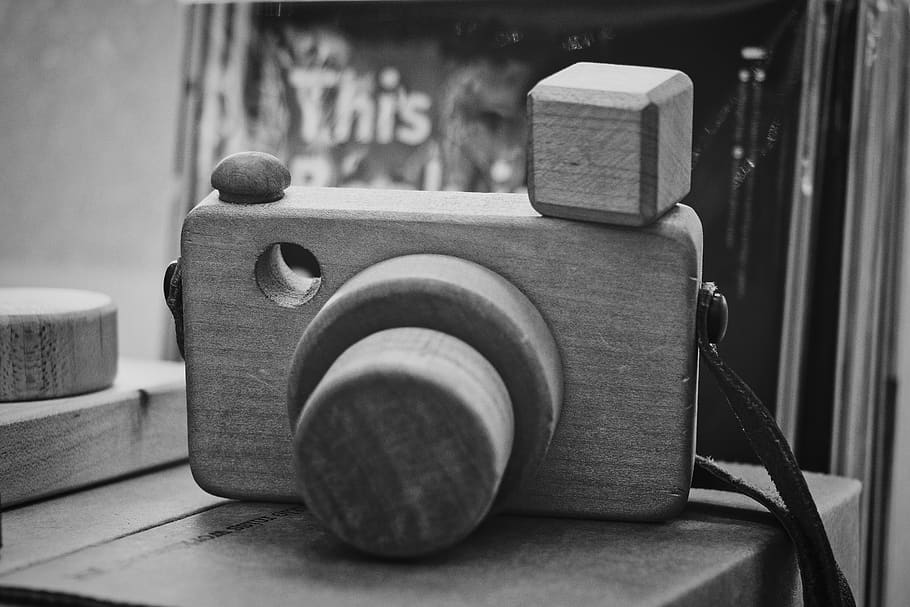 gray DSLR camera miniature, indoors, focus on foreground, no people HD wallpaper