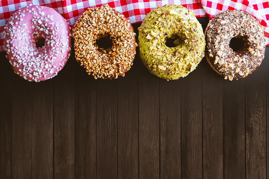 Four fantastic American donuts on a wooden table, food, food and drink HD wallpaper
