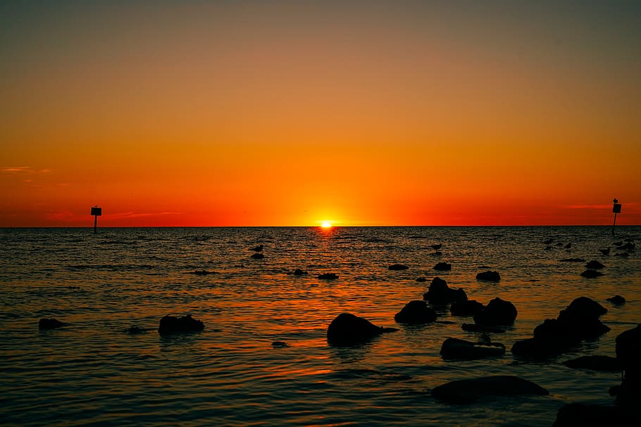sun set over the ocean, nature, outdoors, sky, dusk, red sky HD wallpaper